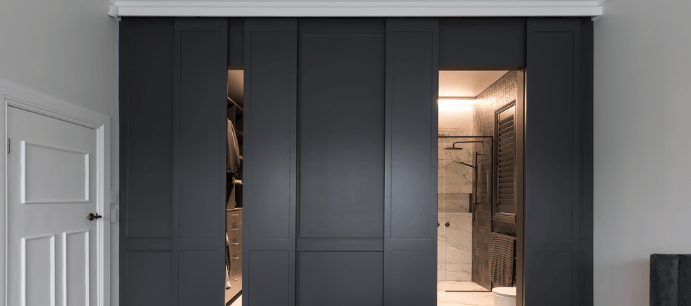 bathroom sliding door and barn door wardrobe by award winning interior designer Katie Scott Design 