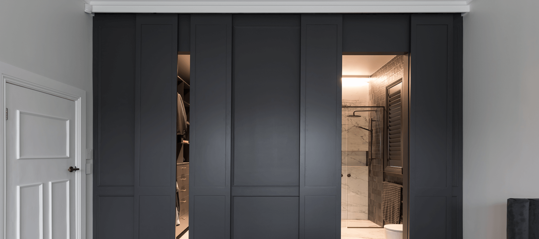 bathroom sliding door and barn door wardrobe by award winning interior designer Katie Scott Design