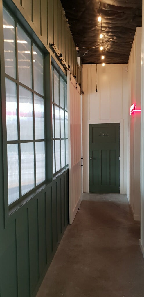 large white barn door in cafe Auckland