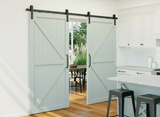 Estrada Curve Roller bi-parting barn door system with double doors in modern kitchen