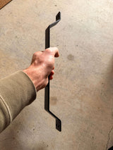 largeblack handle in hand